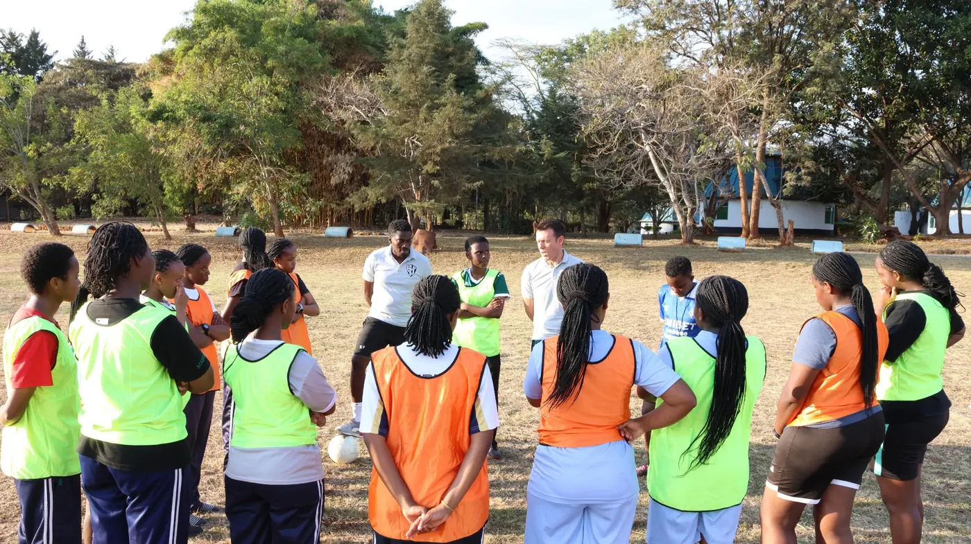 Coaches briefing Pioneer Girls players